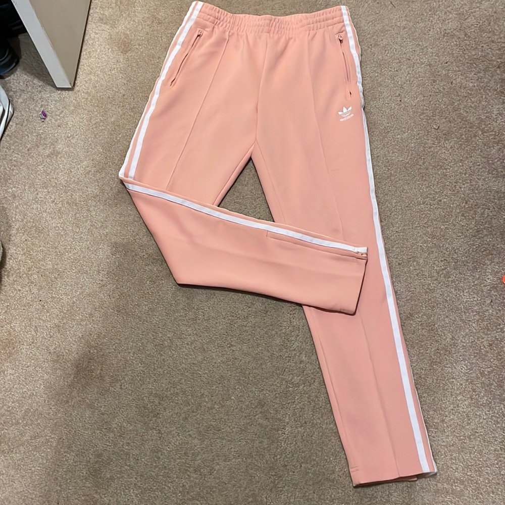 Adidas coral size small. Tapered ankle with zipper